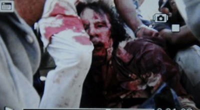 Муамар Каддафи скончался от ранений [Фото]