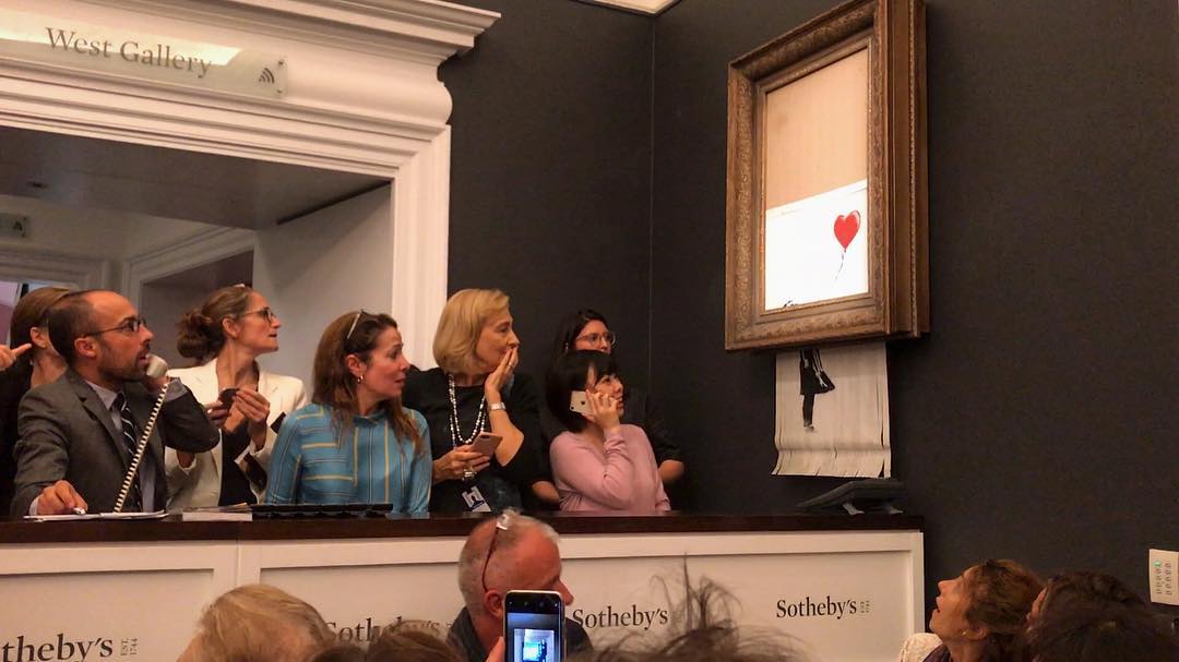 Проданная за миллион фунтов картина Бэнкси самоуничтожилась прямо на аукцио ...